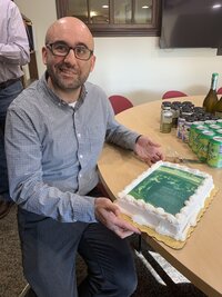 picture of Andrew Ross with cake 