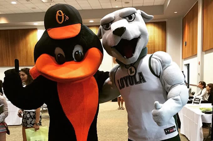 The Baltimore Orioles and Loyola Greyhounds mascotts posing together