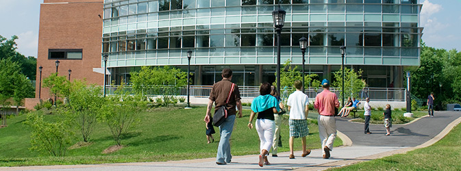 Students walking towards library