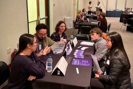 Ellen Ambrose, Erem Kazancıoğlu and Christa White from Protenus speaking with students at Career Night