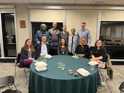 Faculty and community members at dinner