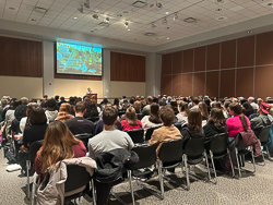 Large crowd listening to Rachel Swarns