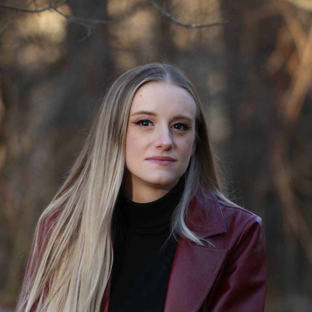 Headshot of Sophia Bell standing outdoors.