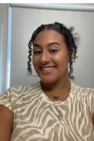 Female Student smiling to the camera.