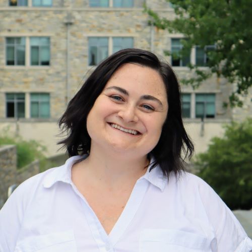 headshot of Grace Shepperd in front of Sellinger School of Business