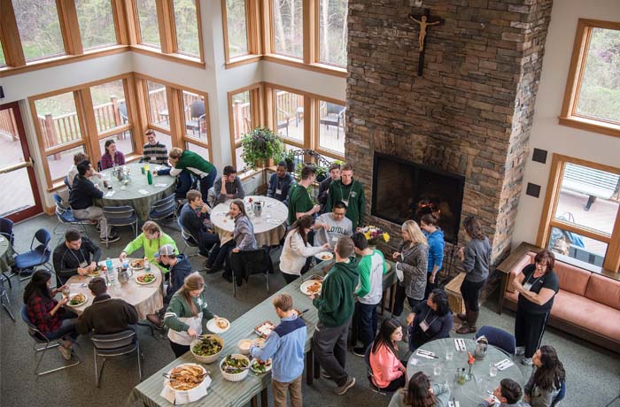 Aerial shot of the interior of Loyola's retreat center, where attendees are enjoying a meal
