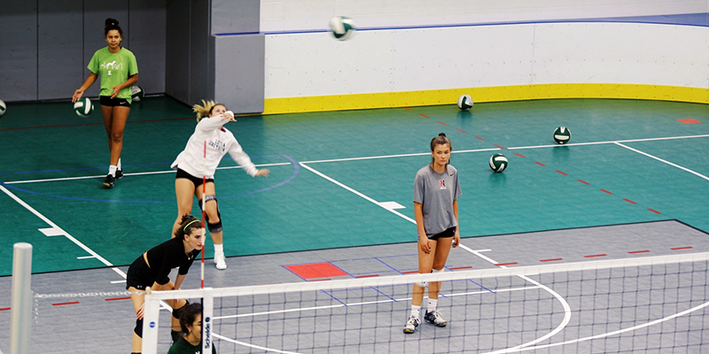 Club volleyball players in a practice session