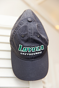Loyola ball cap hanging on a wall