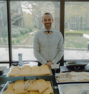 David Tiscione Let's Taco Bout Consent David Tiscione standing behind taco bar at outreach event for affirmative consent