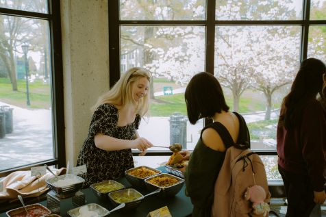 Sydney Quantock - Let's Taco-Bout It Sydney Quantock helping student at Affirmative Consent taco bar