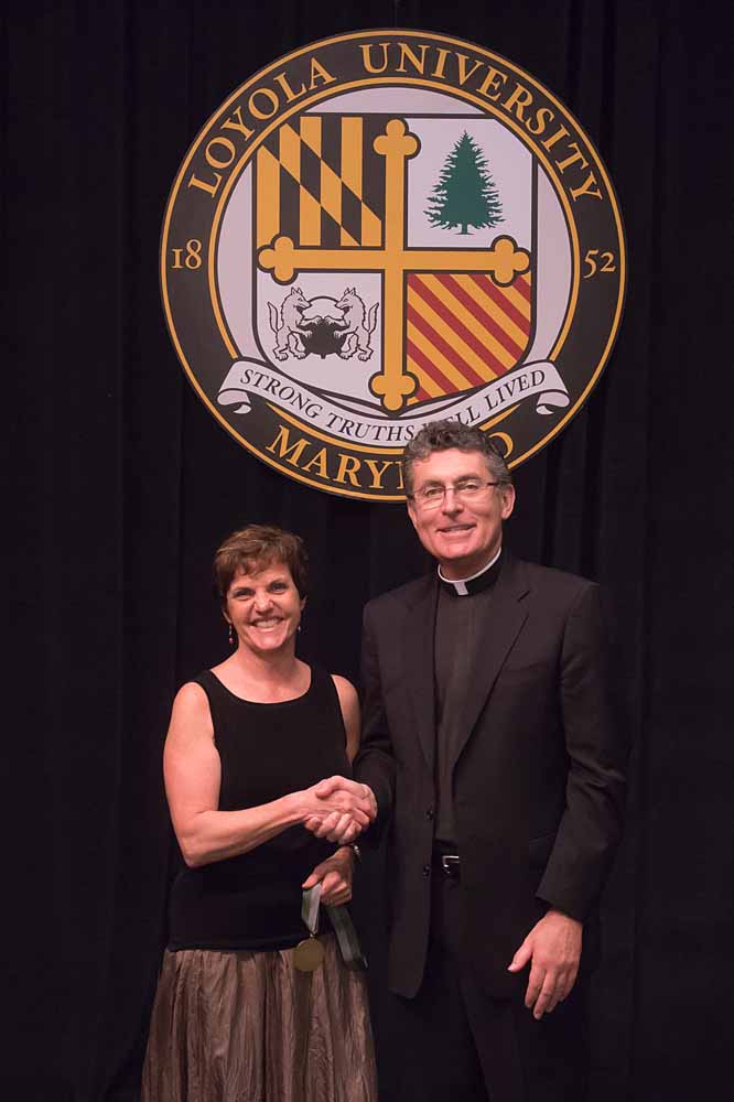 Janet Price (accepting award for Anne Spinelli), Fr. Linnane