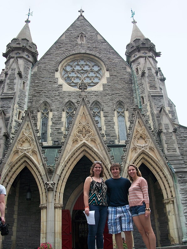 Loyola students pose in front of Christ Church Cathedral in downtown Montreal