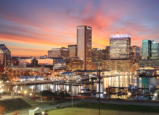 Photo of sunset over downtown Baltimore and the Inner Harbor