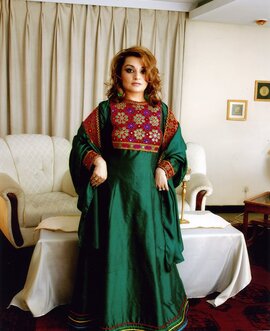Bahar Jalali, Ph.D., visiting associate professor of history at Loyola University Maryland, wearing a traditional Afghan dress