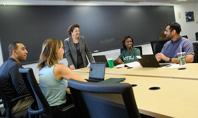 Students smiling with an instructor in Sellinger