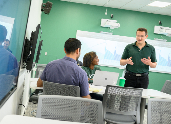 a professor engaging with his students during class