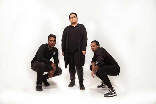 Male models posing against a white background wearing all black 2.