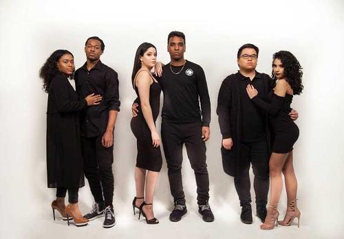 Three male and three female models posing together in pairs wearing all black against a white background.