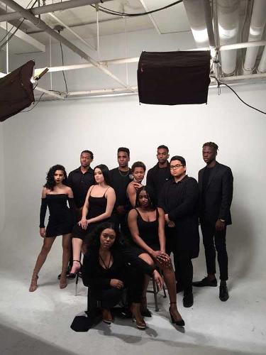 A behind-the-scenes view of a group photo shoot.