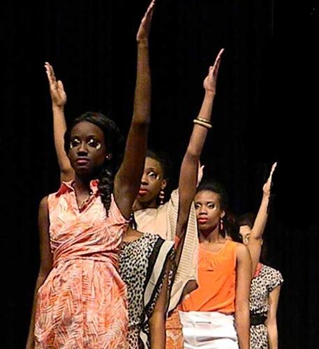 6 female models standing in a stacked line with arms raised.