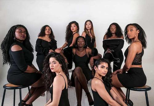 Female student models in various poses wearing all black against a white background.