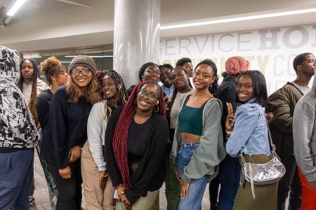 Students of color smile at the Black Student Association (BSA) Soul Food event